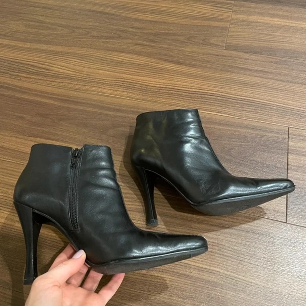 Sleek Black Leather Heeled Boots
